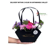 Blissful Mix Flowers In Hand Bag